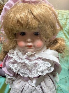 Vintage Pink and Blonde Doll on a metal stand